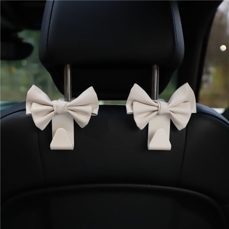 BVGACI 2 Pack Car Purse Hooks, Cute Bow Car Seat Headrest Hook Hanger for Purses and Bags.(white) - Image 1